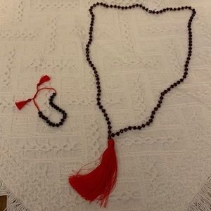 Diamond Cut Black Crystal Necklace with Red Tassel